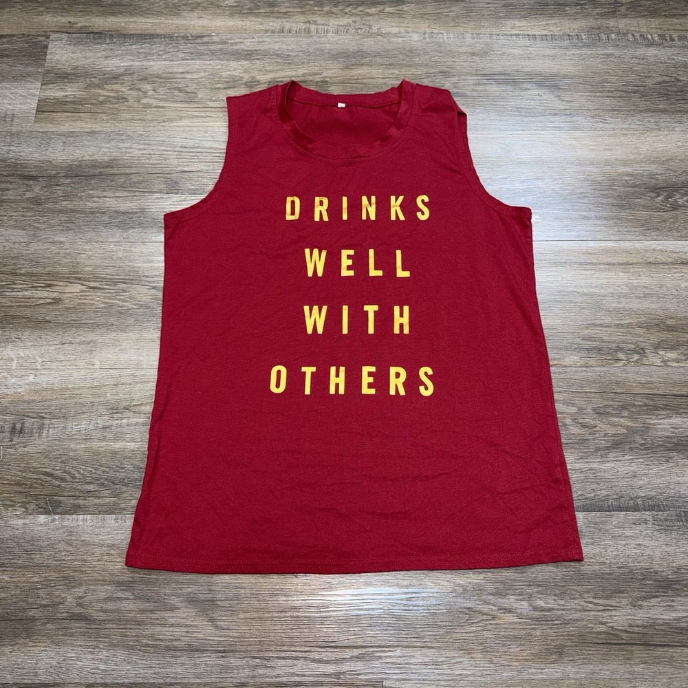 Maroon Shirt Unisex Size L Sleeveless Gold Spell-Out "Drinks Well With Others"